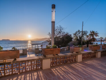 Architect-designed coastal townhouse for sale in palma with heated pool and roof terrace