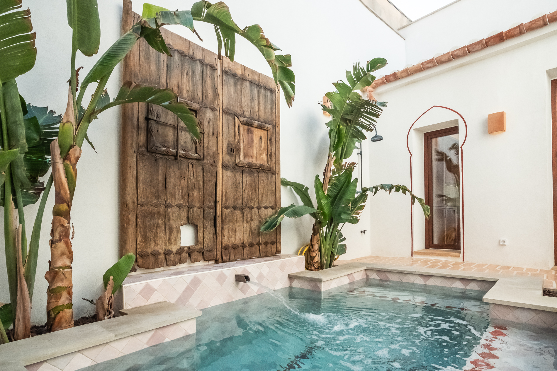 Architect-designed coastal townhouse for sale in palma with heated pool and roof terrace