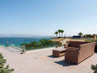 Elevated sea view townhouse with rooftop solarium & pool for sale in cala blava